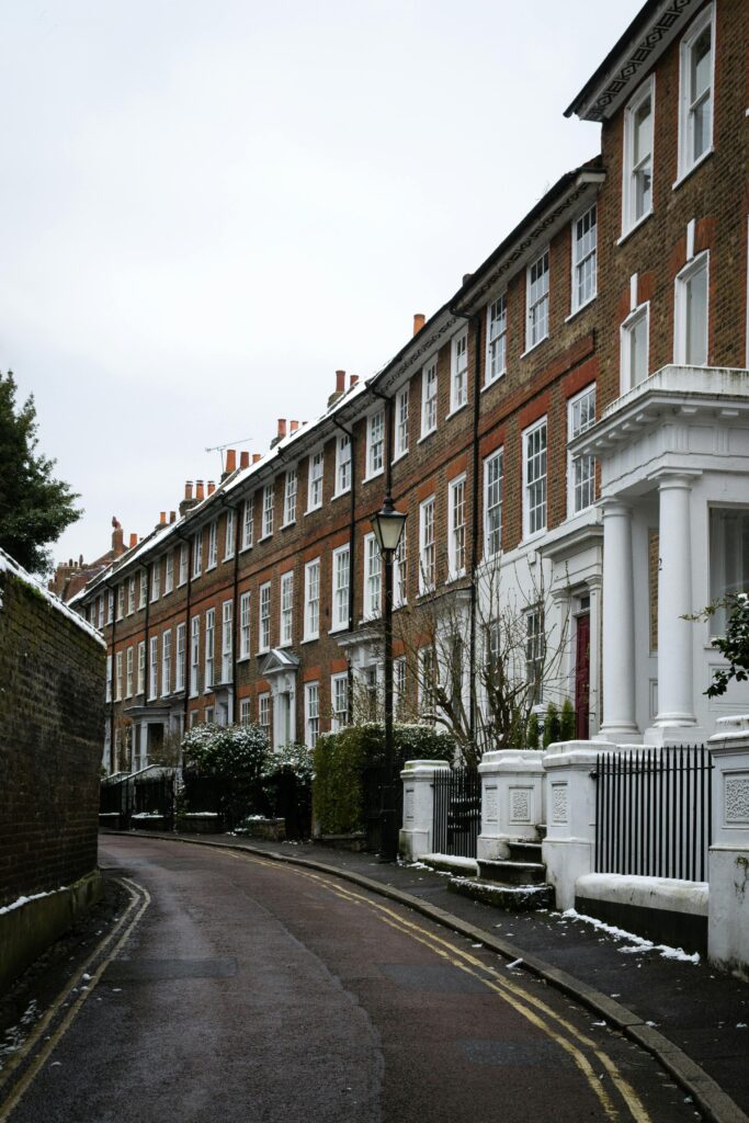 Captivating view of Twickenham townhouses lined along an empty street in England.